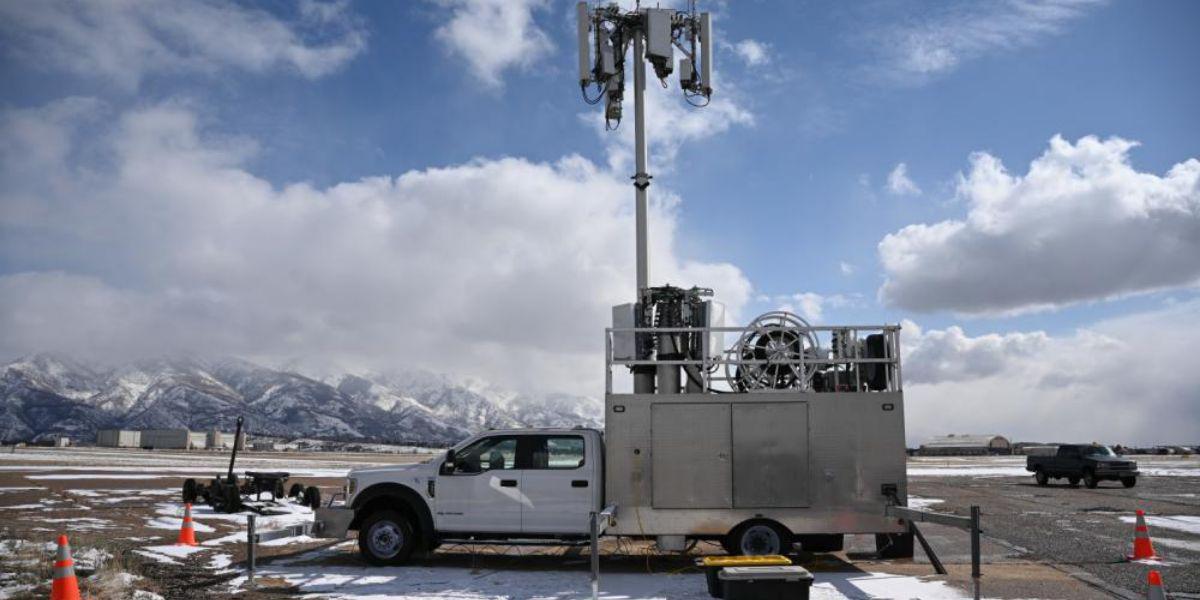 The Department of Defense is in the process of rolling out 5G communications at its military bases, including at Hill Air Force Base, Utah, pictured with a 5G mobile test station on the flight line to examine 5G-related avionics testing. The plan, however, is to leverage commercial sector 5G-related technologies and networks outside the United States, including cloud capabilities. U.S. Air Force photo by R. Nial Bradshaw