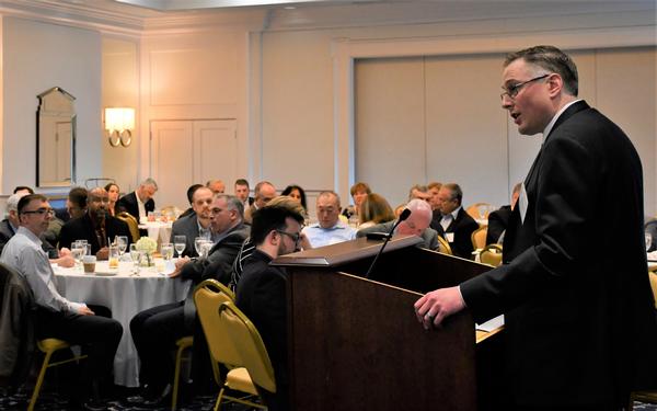 Wayne Schoonveld, chief, Systems Engineering, Architecture, Modeling and Simulation Division of the Space and Terrestrial Communications Directorate, addresses the lunch crowd at the chapter's April luncheon<br />Photo Credit: Mr. Edric Thompson, Team Leader, C5ISR Public Affairs Office 