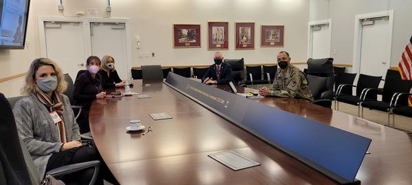 Chapter Executive Council members update Maj. Gen. Robert L. Edmonson II, USA, senior commander of Aberdeen Proving Ground and commanding general U.S. Army Communications-Electronics Command.� Pictured in the CECOM Command Conference Room (from l-r) are Mallory Arnold, chapter executive vice president; Mary Jane Jernigan, Army liaison; Karen Holt, community liaison; Col. Bill Montgomery, USA (Ret.) (MHR), chapter president; and Gen. Edmonson.�
