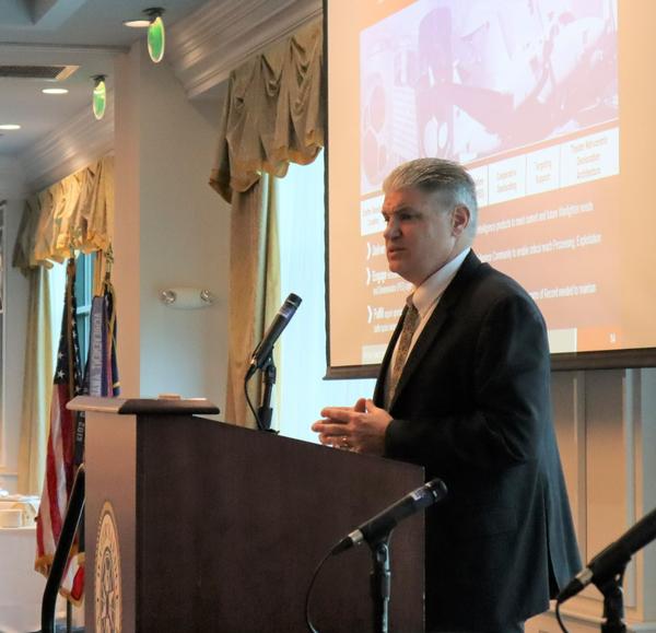 Dennis Teefy, project director, Sensors-Aerial Intelligence, addresses the January Luncheon crowd at Water's Edge.
