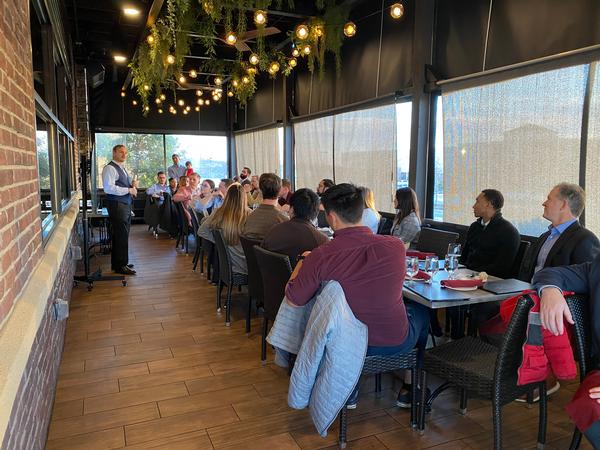 Giorgio Bertoli, assistant director for Spectrum Dominance and Intelligence Portfolio within the Army's Command, Control, Computers, Communications, Cyber, Intelligence, Surveillance and Reconnaissance (C5ISR) Center, presents to the chapter's Emerging Leaders at the new Leadership and Cocktails series in February.