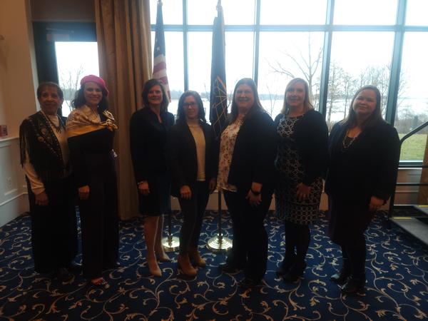 In February, the Women in Leadership panel gathers for a photo before the luncheon.