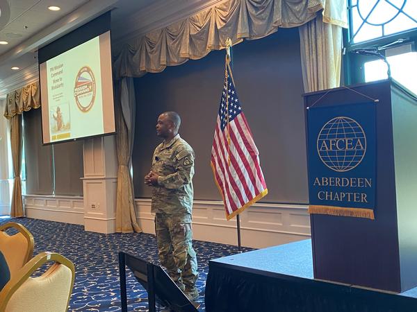 Col. Shermoan Daiyaan, USA, program manager (PM) for Mission Command (MC) under Program Executive Office (PEO) Command, Control, Communications - Tactical (C3T), addresses the audience at the June luncheon. Photo Credit: PEO C3T Public Affairs Office