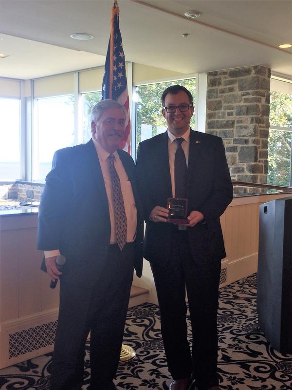 Bill Dunahoo, regional vice president, Maryland Region (l), presents  Mike Bowen, former chapter president, with an AFCEA Meritorious Service Award at the October luncheon.