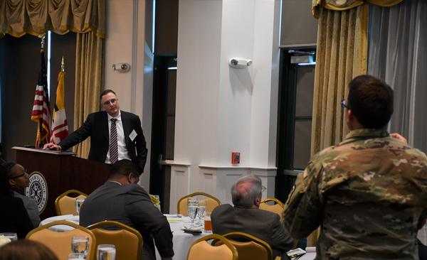 Schoonveld listens to a question asked by an audience member from Aberdeen Proving Ground. <br />Photo Credit: Mr. Edric Thompson, Team Leader, C5ISR Public Affairs Office 
