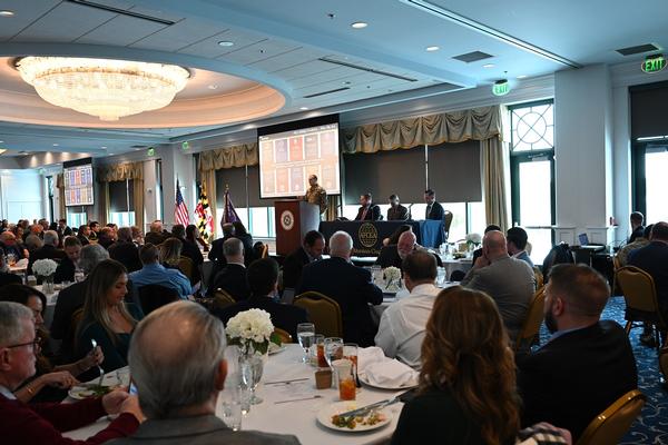 The crowd listens to the PEO IEW&S panel at the January luncheon.