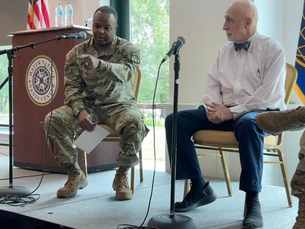 Daiyaan and Justice engage in a panel discussion at the May luncheon. Photo by Katherine Kage