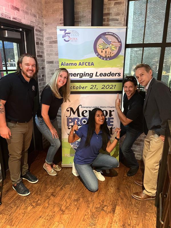 Chapter board of directors and Emerging Leaders volunteers promote the upcoming annual Mentor Protege Night October 21st at Top Golf during another well-attended Tech on Tap event in August where networking, bowling and brew came together. <br />