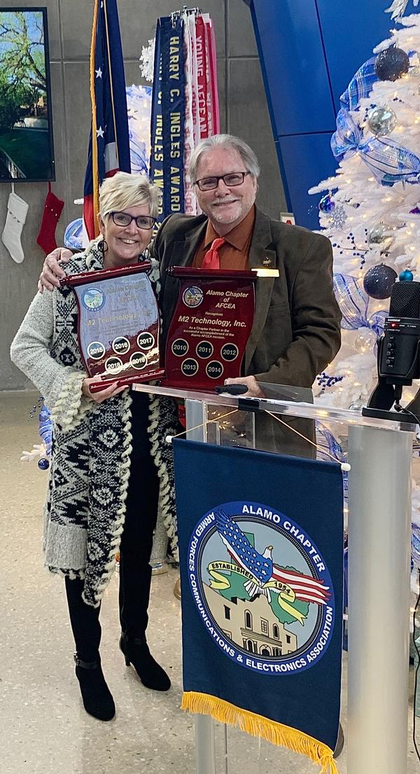 Tom Allen, chapter vice president of corporate sponsorships, presents Karen Grace, chapter president, M2 Technology Inc., the corporate sponsorship plaque. M2 Technology Inc. has been a luncheon corporate sponsor with the chapter for 20 years. The chapter thanks M2 Technology Inc. for its support!