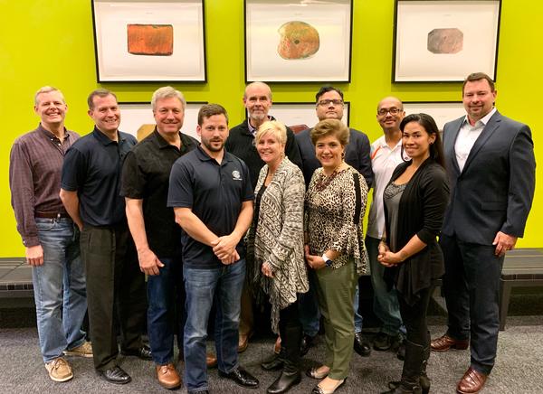 The chapter board of directors pose for a group photo after an in-person off-site in January to discuss 2020 initiatives. 