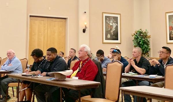 Chapter members and attendees take notes during the Lunch and Learn training class in September. 