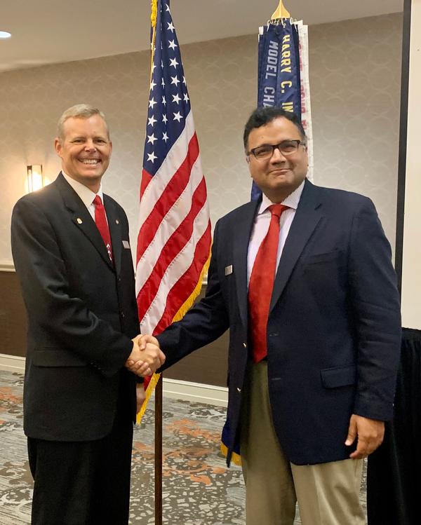 In October, Chapter President Rick Lipsey (l) congratulates Vice President of Awards Khurram Qureshi in executing the first dedicated awards luncheon in many years.