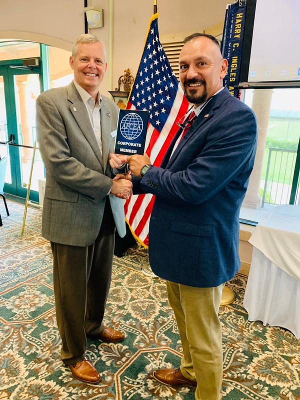 During the chapter's July luncheon, Rich Ruiz, senior engineer, Abacus, accepts the AFCEA corporate member plaque from Lipsey for their continuous support. 