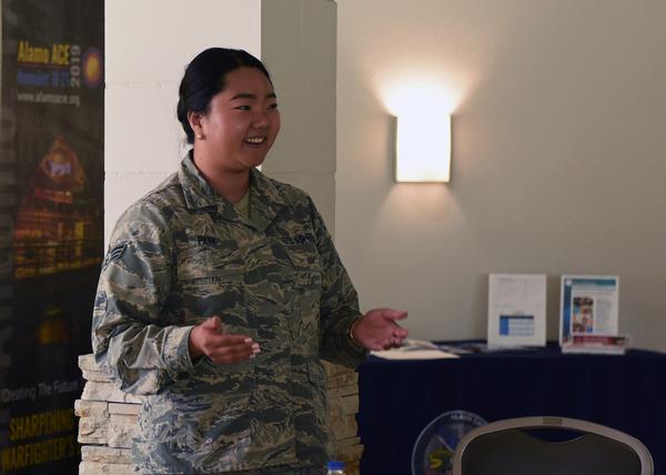 Senior Airman Christine Park, USAF, 68th Network Warfare Squadron and a graduate of the intelligence training pipeline at Goodfellow Air Force Base, gives a testimonial of her journey from training to participating in active missions to her role as Secretary of the chapter Young AFCEANs during the September event.