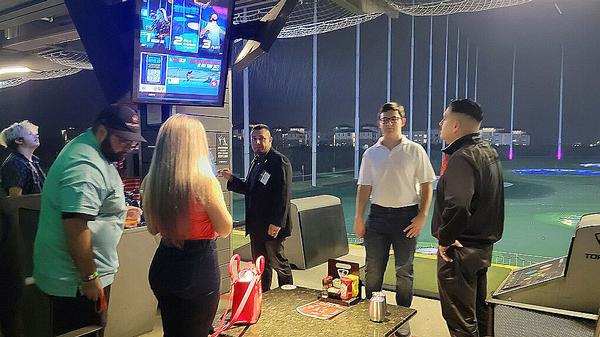 In October, attendees hit a few rounds at Top Golf after speed networking. 