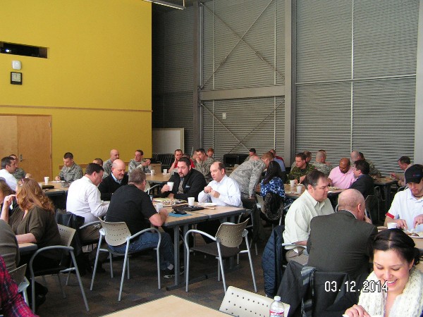 More than 60 members and guests attend the March luncheon.