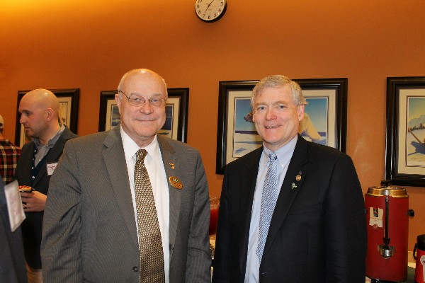 Alaska Lt. Gov. Mead Treadwell (r) joins together with Lt. Gen. Tom Case, USAF (Ret.), chancellor of the University of Alaska-Anchorage, during an event with the chapter in April.