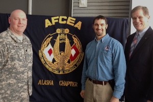 Lt. Col. Mike Brown, USA (l), chapter president, joins Jeffery Roberts (c), aerospace engineer, and Dale Nash, chief executive officer of the Alaska Aerospace Corporation, at the February meeting.