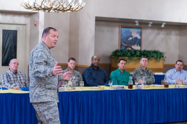 Col. Michael Finn II, USAF, senior communicator for Pacific Air Forces, delivers the keynote speech during the February meeting.