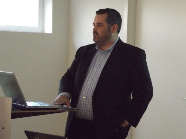 Bock presents new technology information at the chapter's October luncheon.