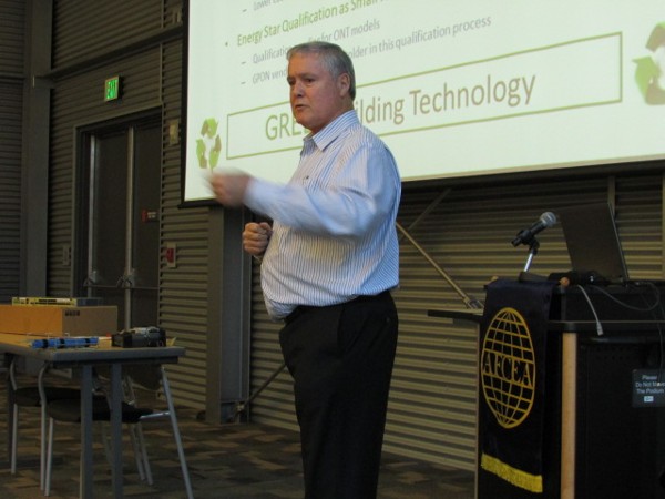 Janda discusses technology advancements with chapter members in November at the luncheon.