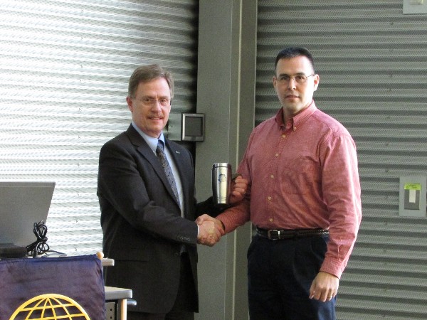 Chapter President David Elder (r) presents Shier with a token of appreciation for attending the January luncheon.