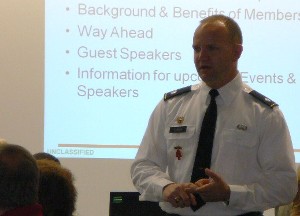 Lt. Col. Charles Parker, USA, chapter president, delivers the opening remarks at the chapter's September meeting.
