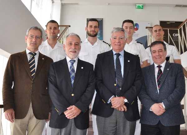 In May, Rear Adm. Carlos Rodolfo, PRT N (Ret.), AFCEA regional vice president, Atlantic Region (2nd from r), Rear Adm. Mario Durao, PRT N (Ret.), chapter president (3rd from r), and Pedro Filipe, chapter treasurer and event coordinator, meet with AFCEA Almada Student Club participants at the meeting, including Victor Lobo, faculty adviser (r), and students (2nd row, l-r) ASPOF EN-AEL Sampaio Pereira; ASPOF EN-MEC Castro Fernandes; CAD EN-AEL Valýrio Rodrigues; CAD EN-AEL Fernandes Rodrigues.