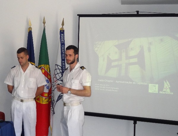 ASPOF EN-MEC Castro Fernandes (r) and ASPOF EN-AEL Sampaio Pereira (l) deliver the Almada Student Club presentation at the May meeting in Lisbon, Portugal.