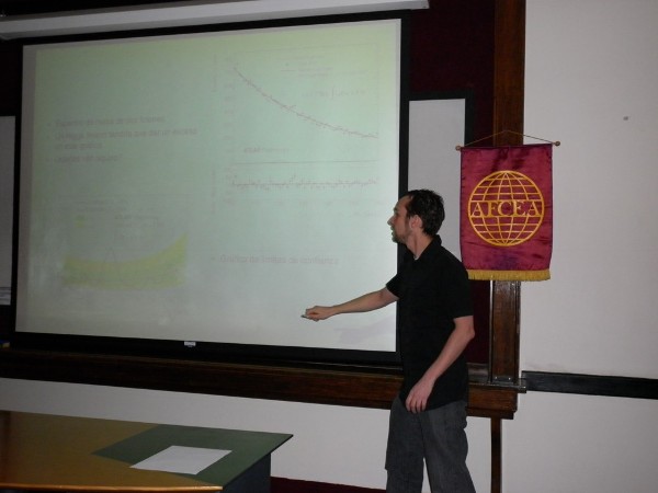 Fernando Monticelli, who has a Ph.D. in physics, addresses attendees at the chapter's May conference on the Large Hadron Collider and the Higgs boson.