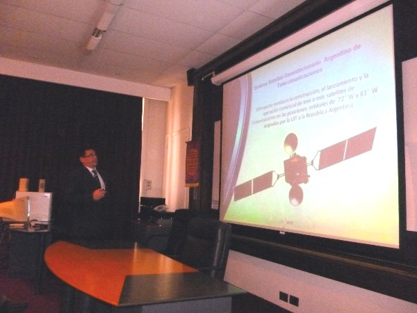ARGENTINA—Eng. Miguel Pesado, director of ArSat, speaks at the May conference at Argentina Army University.