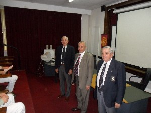Maj. Gen. Herberto Robinson, EA (Ret.) (l); Luis Favotto (c), chapter board member; and Rear Adm. Emilio Nigoul, ARA (Ret.), join together at the November conference.