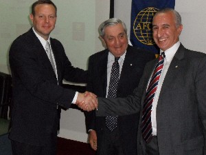 In October, event speaker Federico Gamarra (l), head of Conectia Wireless, meets with Rear Adm. Emilio Nigoul, ARA (Ret.) (c), chapter president, and Luis Alberto Favotto, chapter board member and event coordinator.
