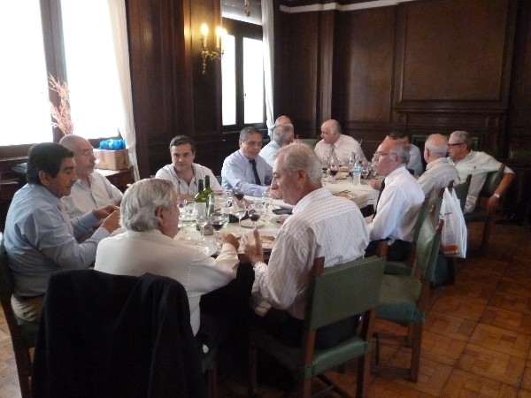 Chapter members attend lunch following the annual meeting in December. 
