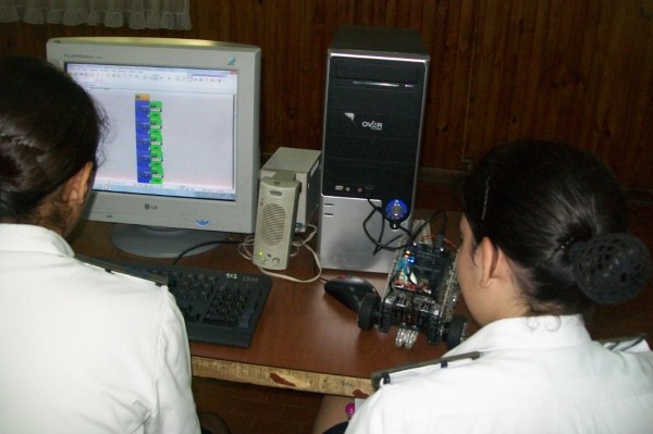 Cadets test a robot during an educational activity in May.