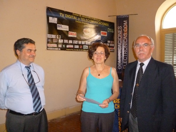 Col. Oscar Gonzalez, FAA (Ret.) (r), chapter vice president, presents certificates of appreciation to Luis Valle and Claudia Cardama, event coordinators for the December Professional Development Course.