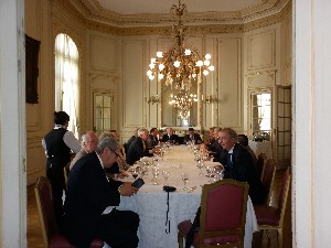 In April, AFCEA International staff members visit with chapter board of director members during a lunch at the Headquarters Military Circle.