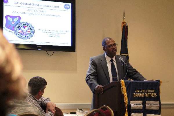 Arthur G. Hatcher Jr., director of communications for Air Force Global Strike Command, addresses the chapter at its monthly membership luncheon in March.