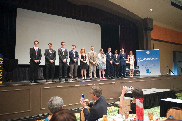 Eleven high school seniors receive scholarships at the chapter's April banquet in Bossier City, Louisiana.