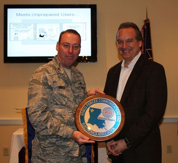 Col. Frank Simcox, USAF, chapter president, presents Glenn Gramling, vice president of sales and business development at Cenzic Security, with a chapter plaque in appreciation for his speech to the chapter in April.