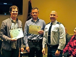 Brandon Oldenburg (l) and Lampton Enochs (c) from Moonbot Studios received annual membership certificates from Lt. Col. Curtis Juell, USAF, chapter president, as a memento for speaking at the chapter's January membership luncheon.