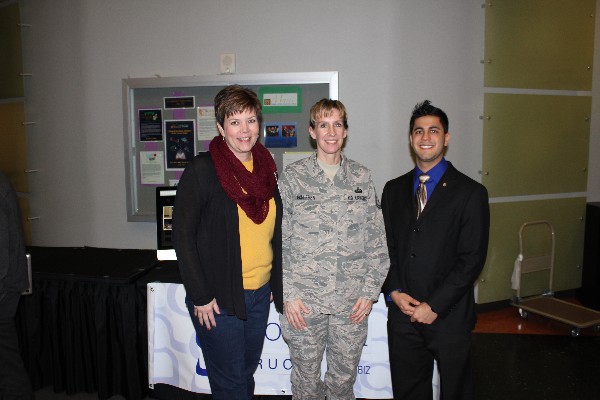 Tracy McGill, Bossier Parish Community College director of public relations, joins Senior Master Sgt. Barbara Schleben, USAF, and Lt. Arora during the chapter's February symposium.