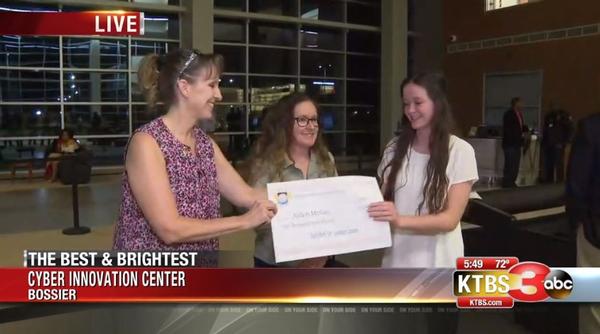 In May, founding chapter member Barbara Schleben presents a $2,000 scholarship check to one of the 14 winners of 2020 made possible by generous local and international sponsors.