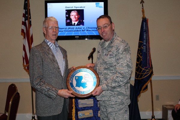Col. Frank Simcox, USAF, chapter president, presents Gen. Closner with a chapter plaque in appreciation for his speech to the chapter in January. Photo courtesy of Jill Macchiaverna.