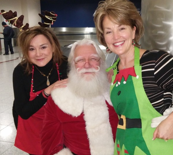 Santa and two of his chapter "Elvettes" support the troops in December.