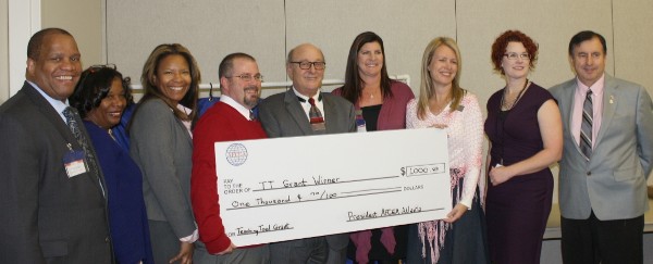 Grant recipients and AFCEA leaders together in January are (l-r) Dr. Vince Patton, executive director of the AFCEA Educational Foundation; Michelle Brown; Maria Brown; Bobby Burford; Mitch Abel; Carla Vashaw; Chas Harsh; Cathrine Nolan; and David Landry, chapter president.