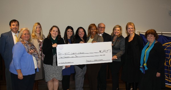 President Dave Landry (far left) and Mitch Able, vice president of education (4th from right), pose with the 2016 Science Teaching Tool Grant winners (second from l to r) Ashli Cook (Carroll County); Susanna Brooks (Coweta County); Diana Kennen (Rockdale County); Heather Pouliot (Henry County); Lisa Bruce (Forsyth County); Sheila Harmony (Gwinnett County); Brenda Horrnady (DeKalb County); Maria Brown (mulit-year winner, Jasper County); and Chas Harsh (multi-year winner, Gwinnett County) at the January luncheon. Not pictured is Tommy Nguyen (Gwinnett County).  
