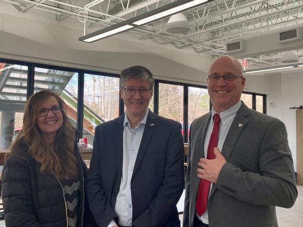 In January, (l-r) Kristan Bagley, Michael Bagley and Chapter President Paul Wertz discuss smart cities and financing.