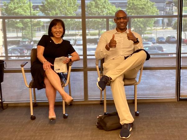 AFCEA Atlanta Small Business Vice President Stacy Vaughn (l) and Richard Yeargin take a well-earned break after opening up the morning session in July.