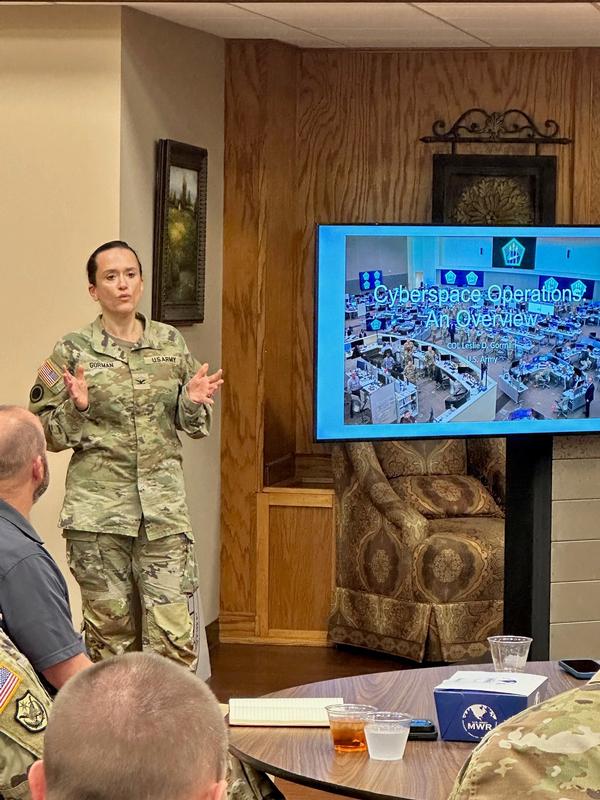Col. Leslie Gorman, USA, director, U.S. Army Cyber Command, provides members of the chapter with an overview of offensive and defensive cyber operations.